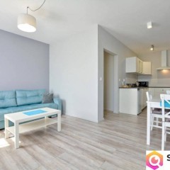 Kamienicę z apartamentami oraz częścią zorganizowanego przedsiębiorstwa sp…