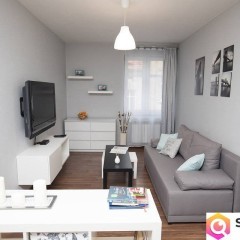 Kamienicę z apartamentami oraz częścią zorganizowanego przedsiębiorstwa sp…