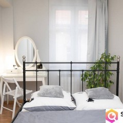 Kamienicę z apartamentami oraz częścią zorganizowanego przedsiębiorstwa sp…