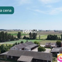 Budynki gospodarcze i dom w Mołożowie