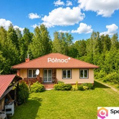 Dom z 35-arową działką i 3 garażami