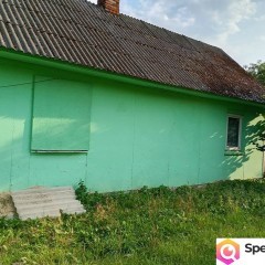 Sprzedam dom drewniany wraz z zabudowaniami gospodarczymi lasem i polem